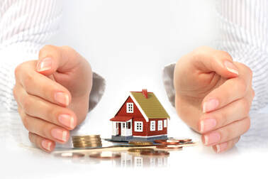 Hands protecting home investment